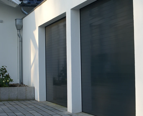 Porte-de-Garage-Point-Fort-Carstyl